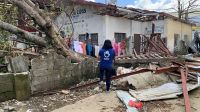 Melanie Ruiz, Operations Manager for HI Philippines and Indonesia, surveys the damage in the town of Surigao in the Philippines.