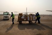 HI workers prepare cargo at M'Poko international airport 