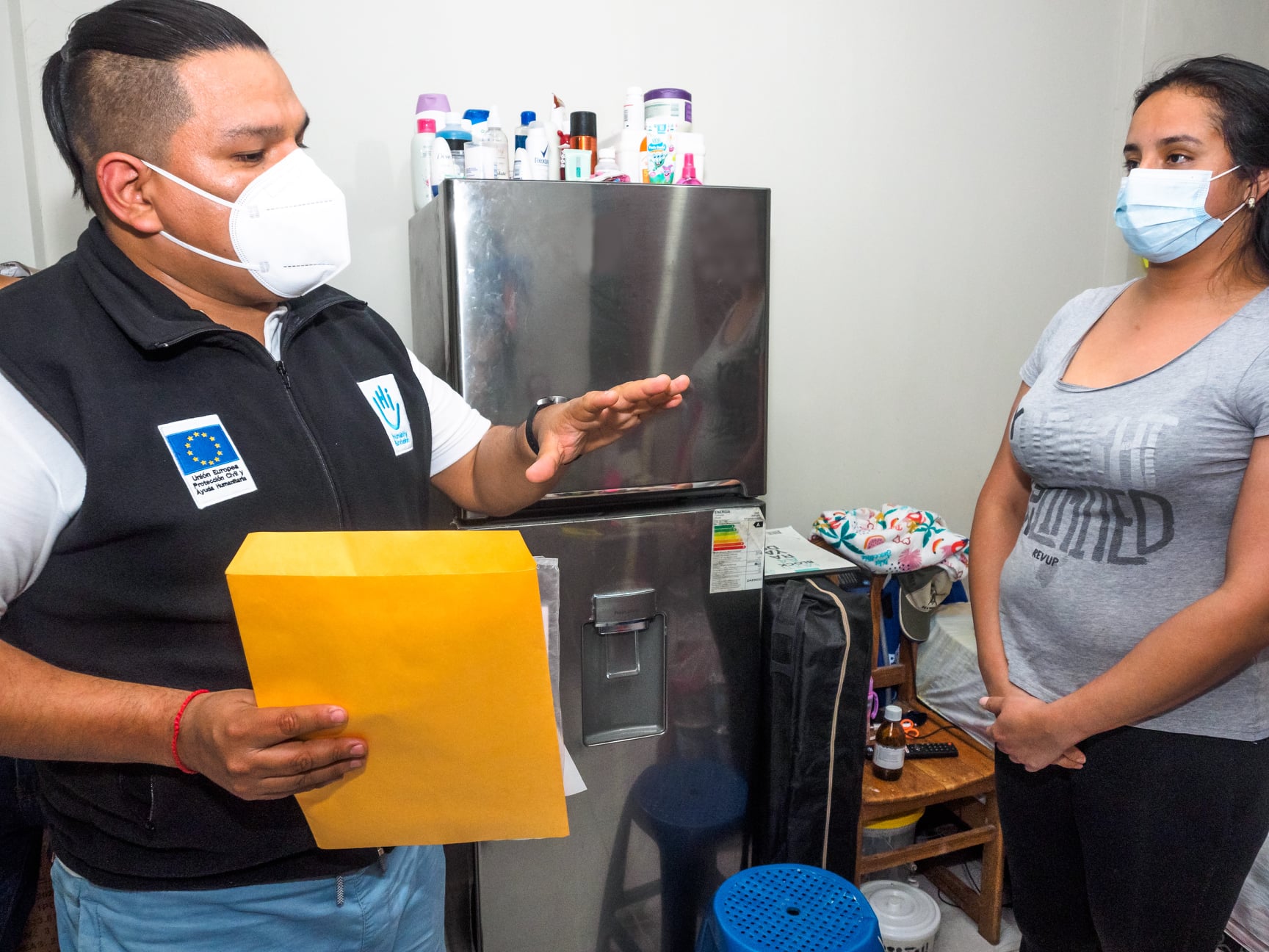 Luisa and an HI employee in Peru.