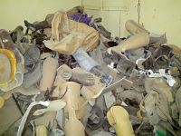 ©A.BANOUNE/HI. A pile of used artificial limb and brace devices in a center