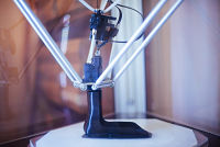 ©D.Komakech-Q. Neely/HI. HI uses a 3D printer to create an orthopedic device