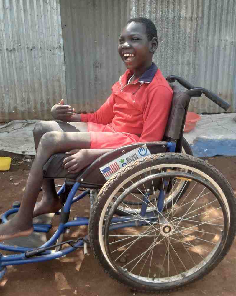  Omod uses his new wheelchair from HI