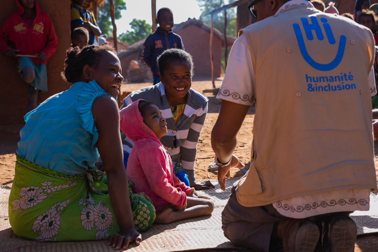 Avotavy's mother (left), Avotavy, Germaine, and HI project manager Celestin (right). © Parany.Photo / HI