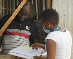 Photo of Racheal Njiru, Disability Inclusive Development Project Manager Kakuma, at work.