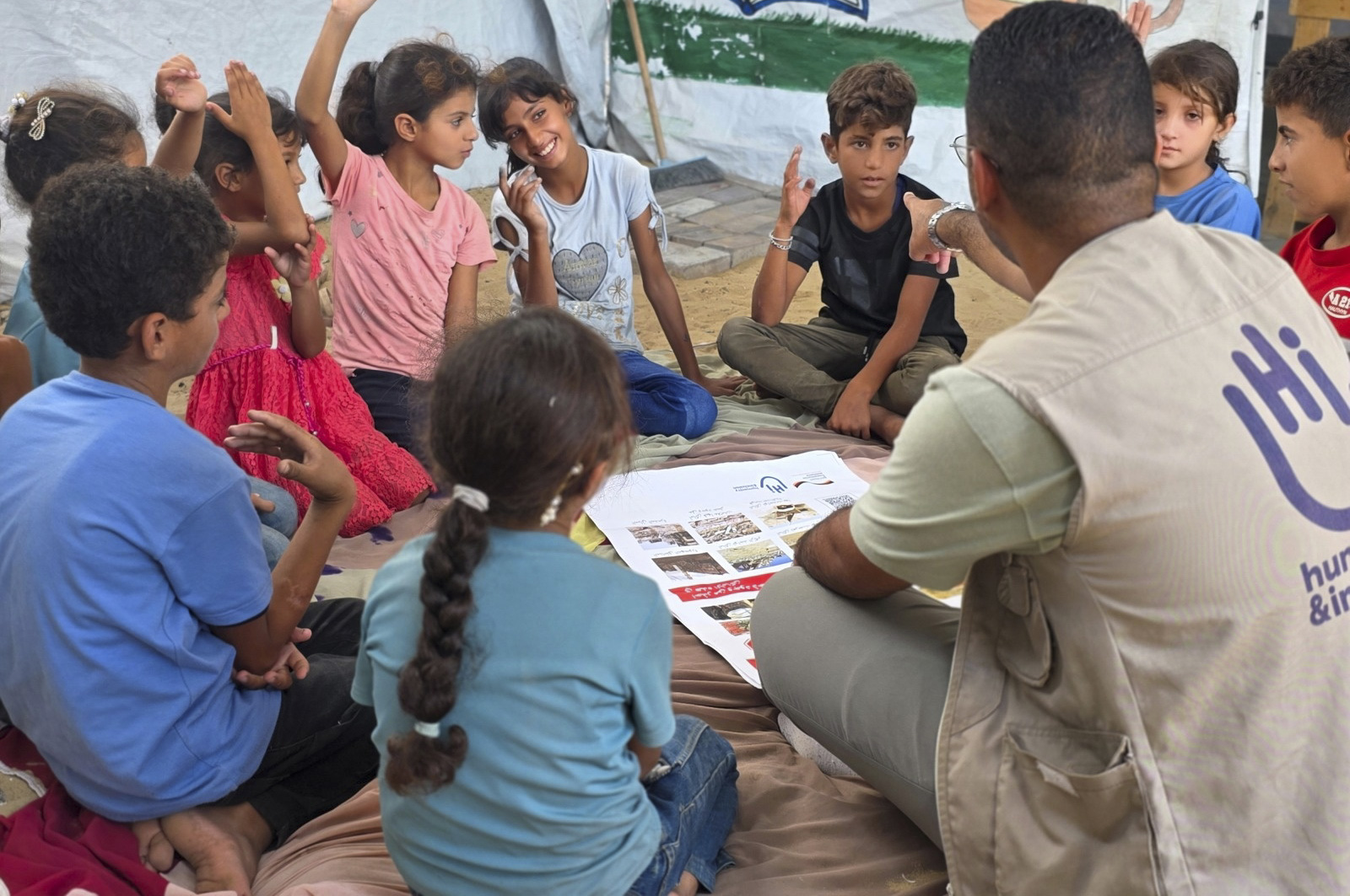 Kareem (black t-shirt) during a risk education session. 