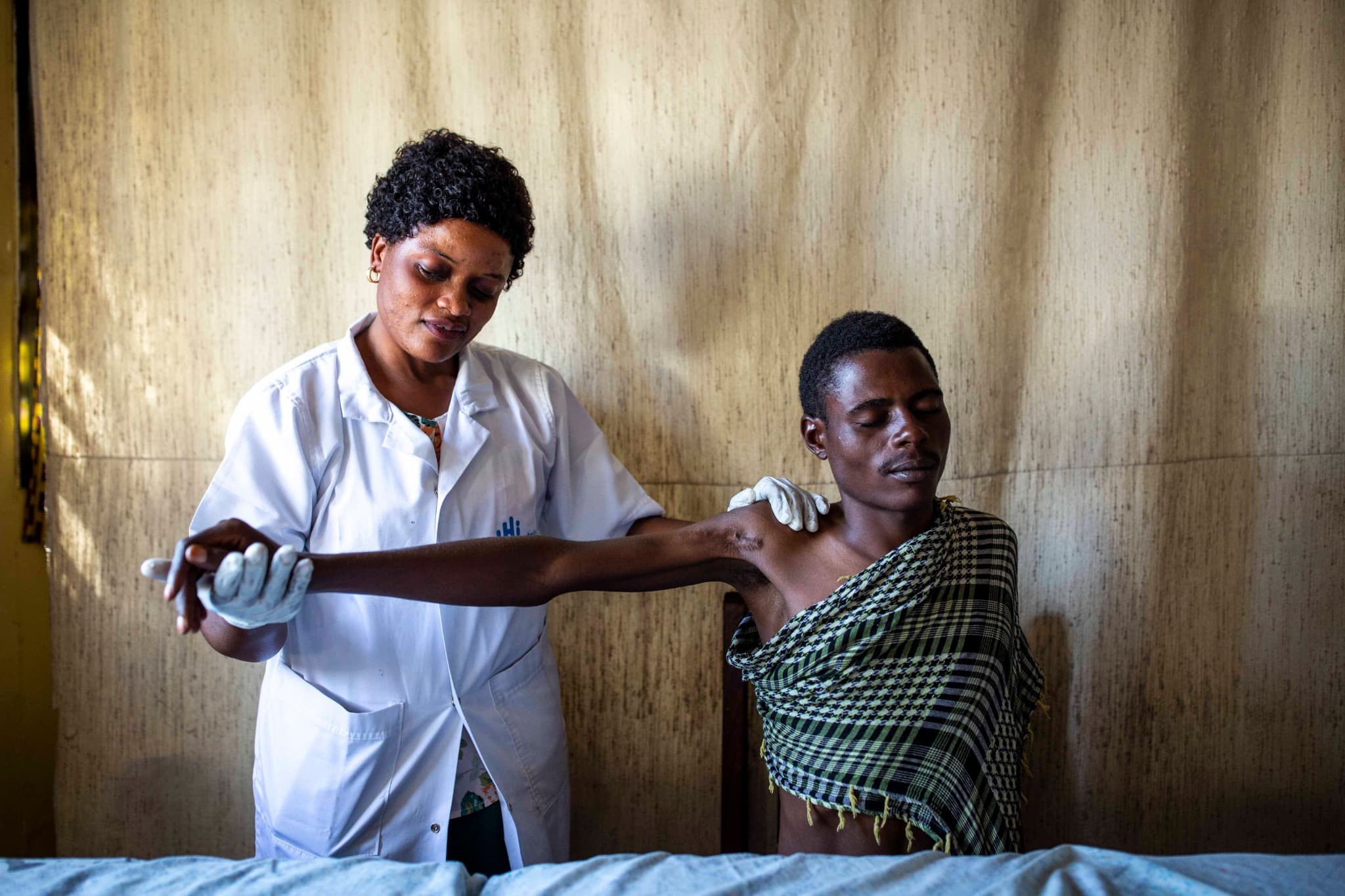 Heritier, 23 years old, is receiving rehabilitation sessions and psychosocial support from HI's teams.