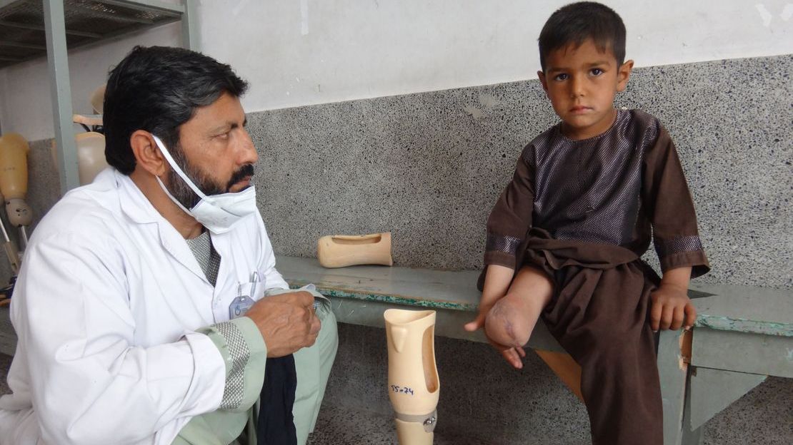 Enayatullah during a rehabilitation session with his physical therapist. 