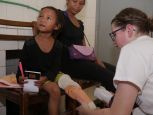 Elinah during the first fitting of her recycled prosthesis in Madagascar 