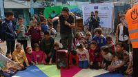 HI volunteers conduct recreational activities for displaced children in a collective shelter in Southern Gaza 