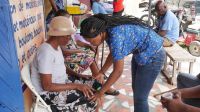 Treating a patient in Les Cayes rehabilitation center run by one of HI’s partner organizations