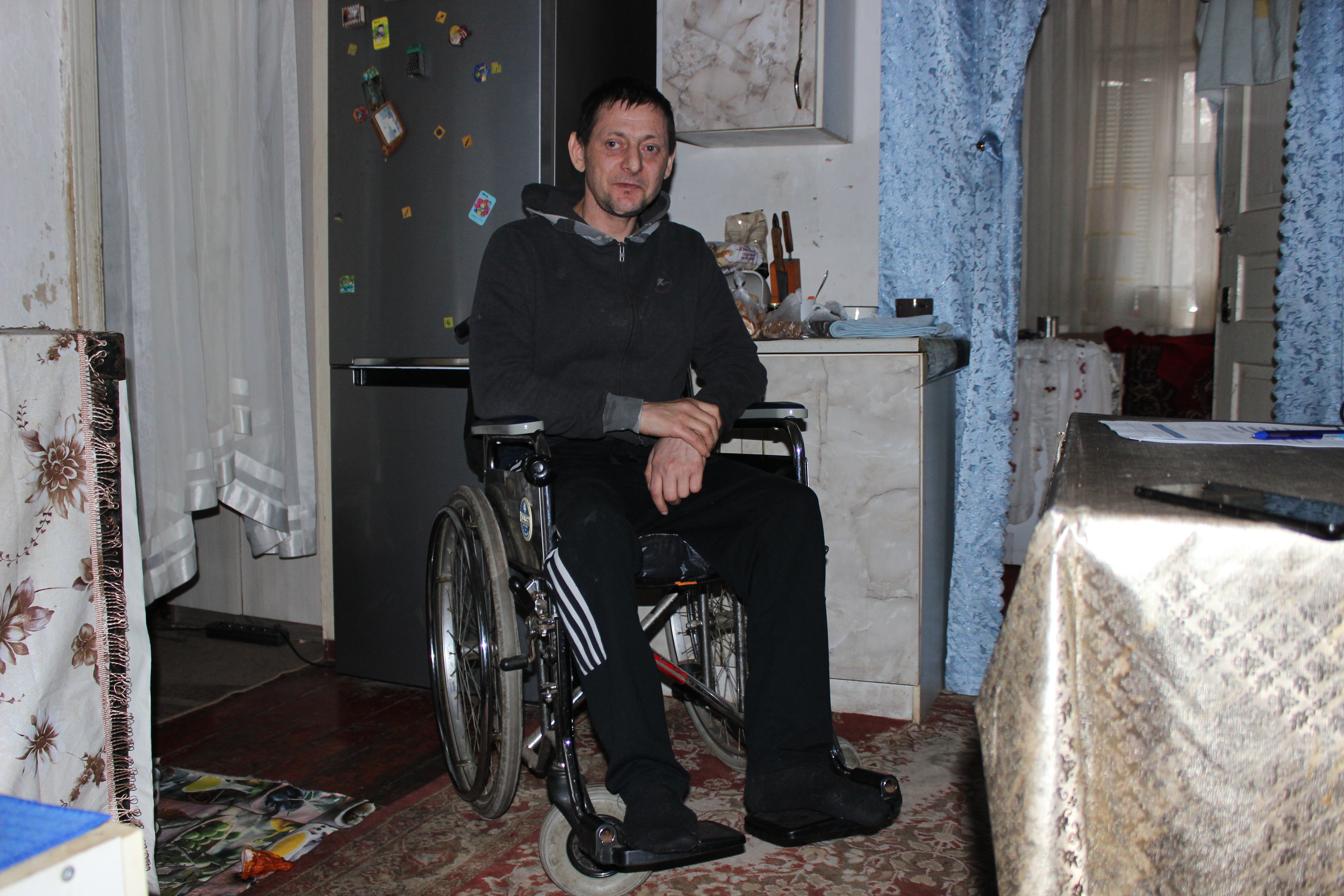 Oleksandr Hurtov has a disability following an unknown disease. He is now displaced after a drone attack at his place. HI. Dnipro, November 2025.