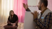 A risk education officer on a home visit in Kifri, Iraq.