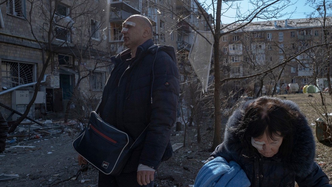 A missile fell in this residential area of Kiev. One child was killed and 23 people were injured. This man and his mother were living in the residential area affected.