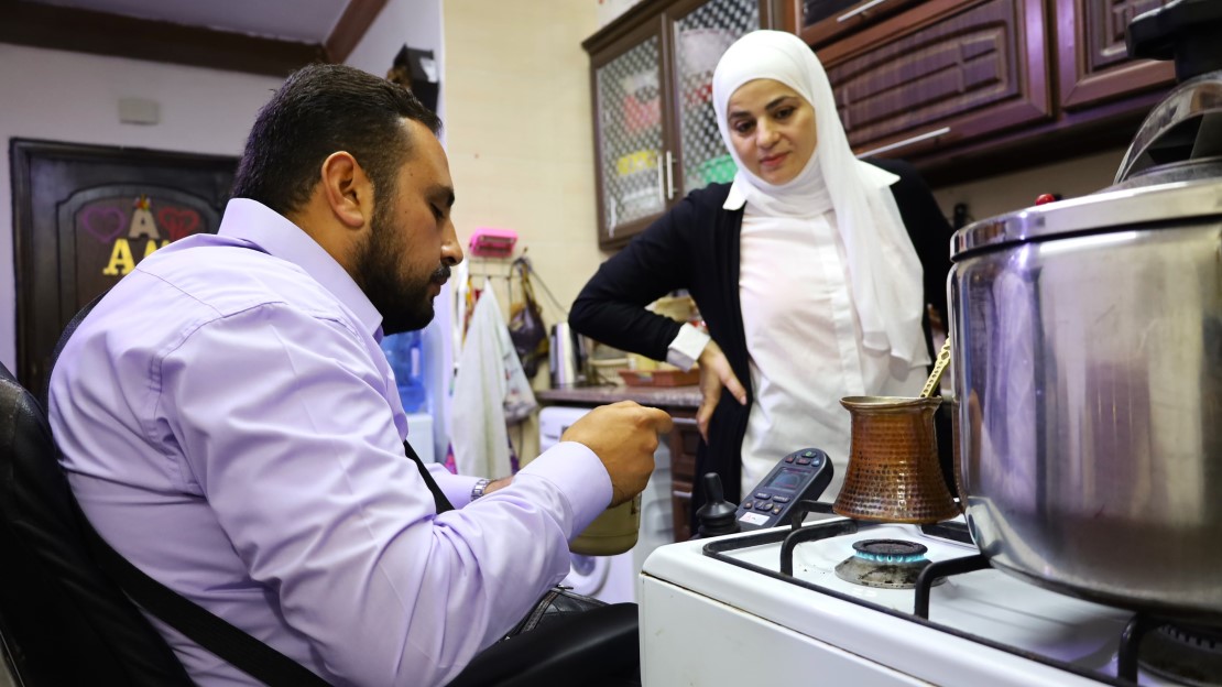 Mohammed and Alia in their kitchen