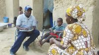 Mohammed meets the mother of a child with disabilities in Timbuktu