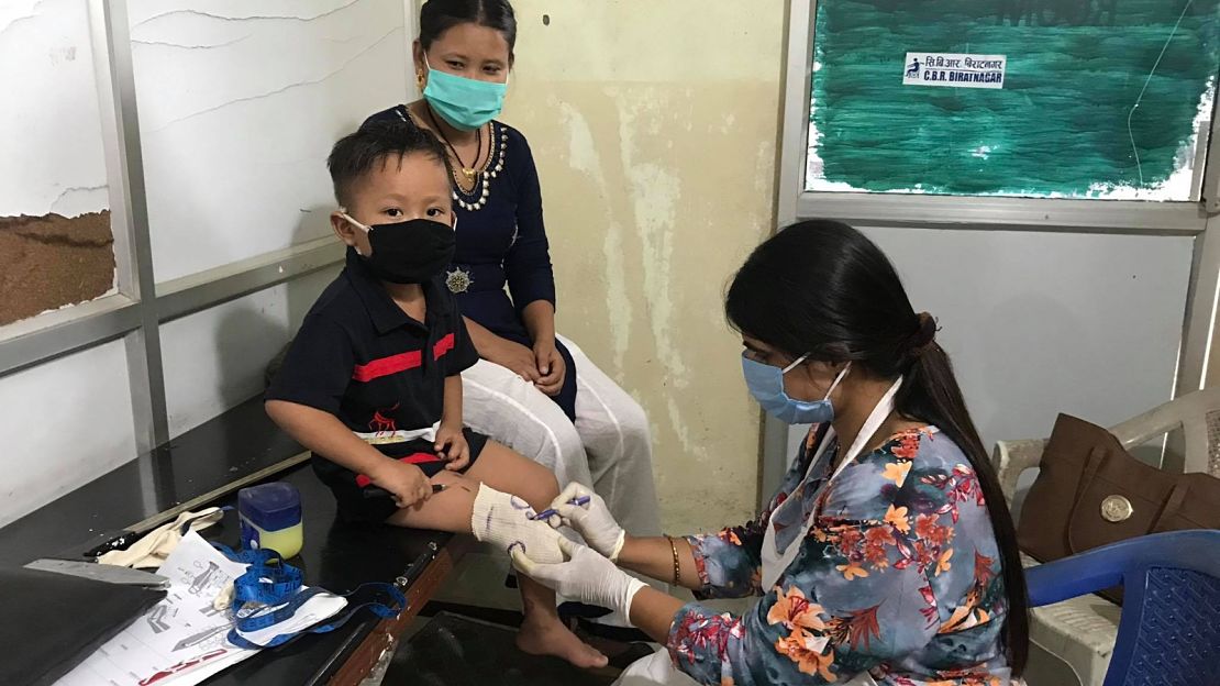 HI staff provides a rehabilitation session for a young boy during the Covid-19 epidemic in Nepal, 2020