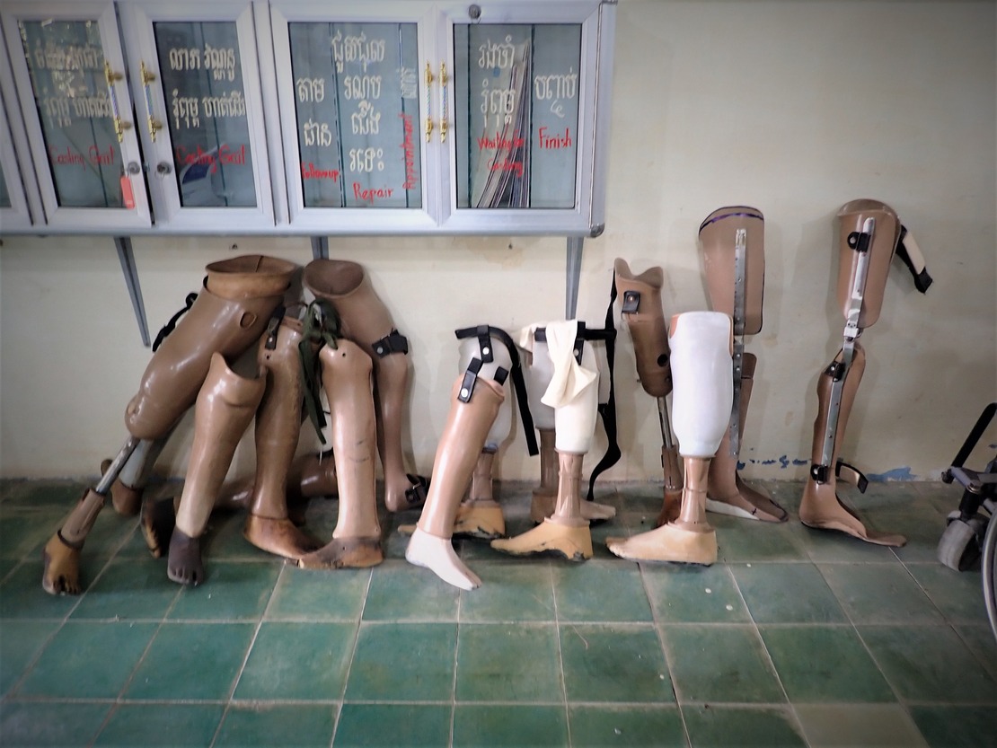 Old and broken devices (here : prosthetic devices) different sizes put into a wall of the Kampong Cham rehabilitation centre.