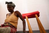 A person with disabilities followed by HI, Bambari, Central African Republic (CAR) 