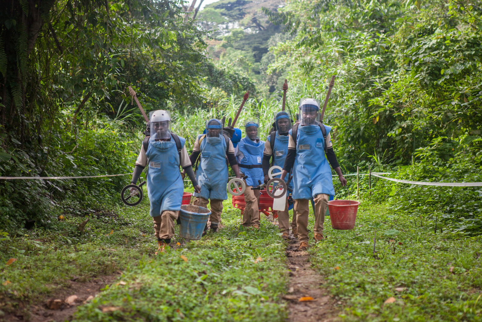 The AFRILAM demining team on its way to a clearance zone on the Itendey site 