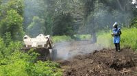 An HI mine clearance expert operating a demining machine in Casamance 