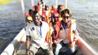 HI members of the Flying Team taking a boat to a location in New Fangak, South Sudan