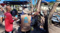 Typhoon Rai - HI staff assessing a family's needs in Bohol Province