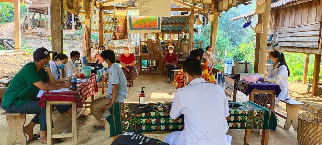 Health staff at a vaccination center in a district of Laos. 