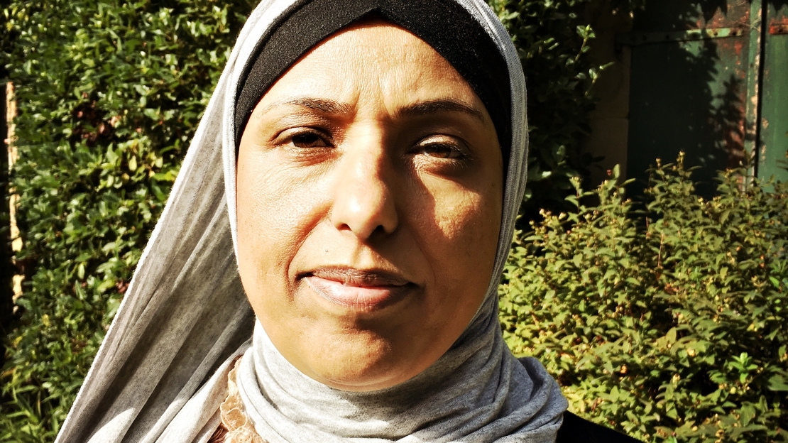 Suad Al-Qadri, a psychosoical support counselor with HI