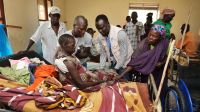 A woman receiving rehabilitation sessions and psychosocial support from HI emergency teams in South Sudan. 