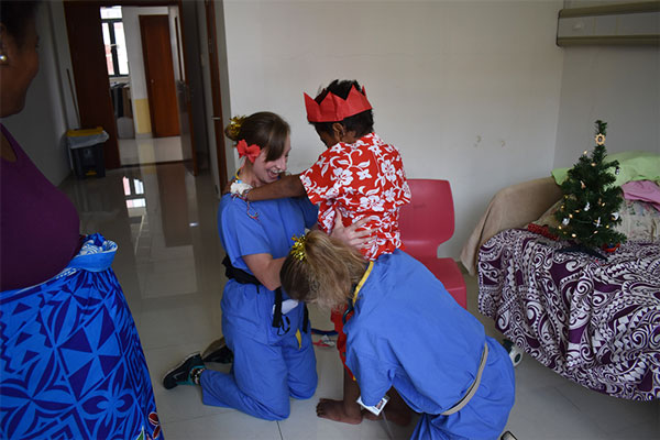 Susie with a patient in Samoa