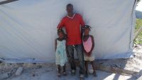 Jeanty Emile and his children lost their house after Matthew hurricane hit Haiti on 4th October 2016.
