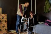 HI Physiotherapist Mo'men does a rehab session with Nawal, a 70-year- old Syrian woman with a hip fracture.