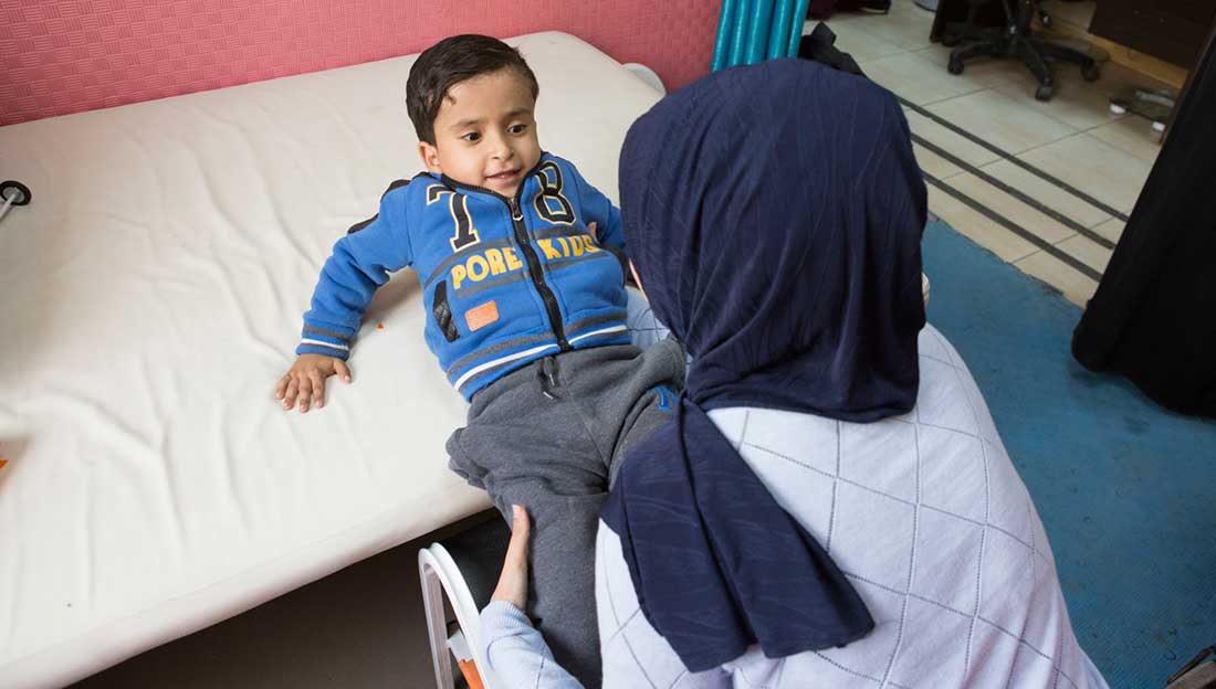 5-year-old Mohammed having a physical therapy session, CDC Zarqa, Jordan