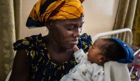 A mother and her child attending the health center in Bumbu, DR Congo.