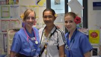 Samoan physical therapist, Rube, with UKEMT members Susie and Maeve