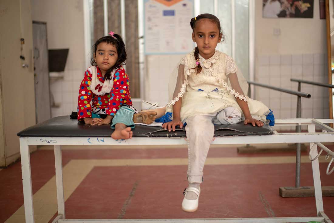  Two young patients from the Sana'a Rehabilitation Center: on the right, Erada, 7, and on the left her cousin Hala, 4.