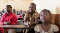 Moussifa, 9 (center), in a French-language lesson with her second-year primary school class 