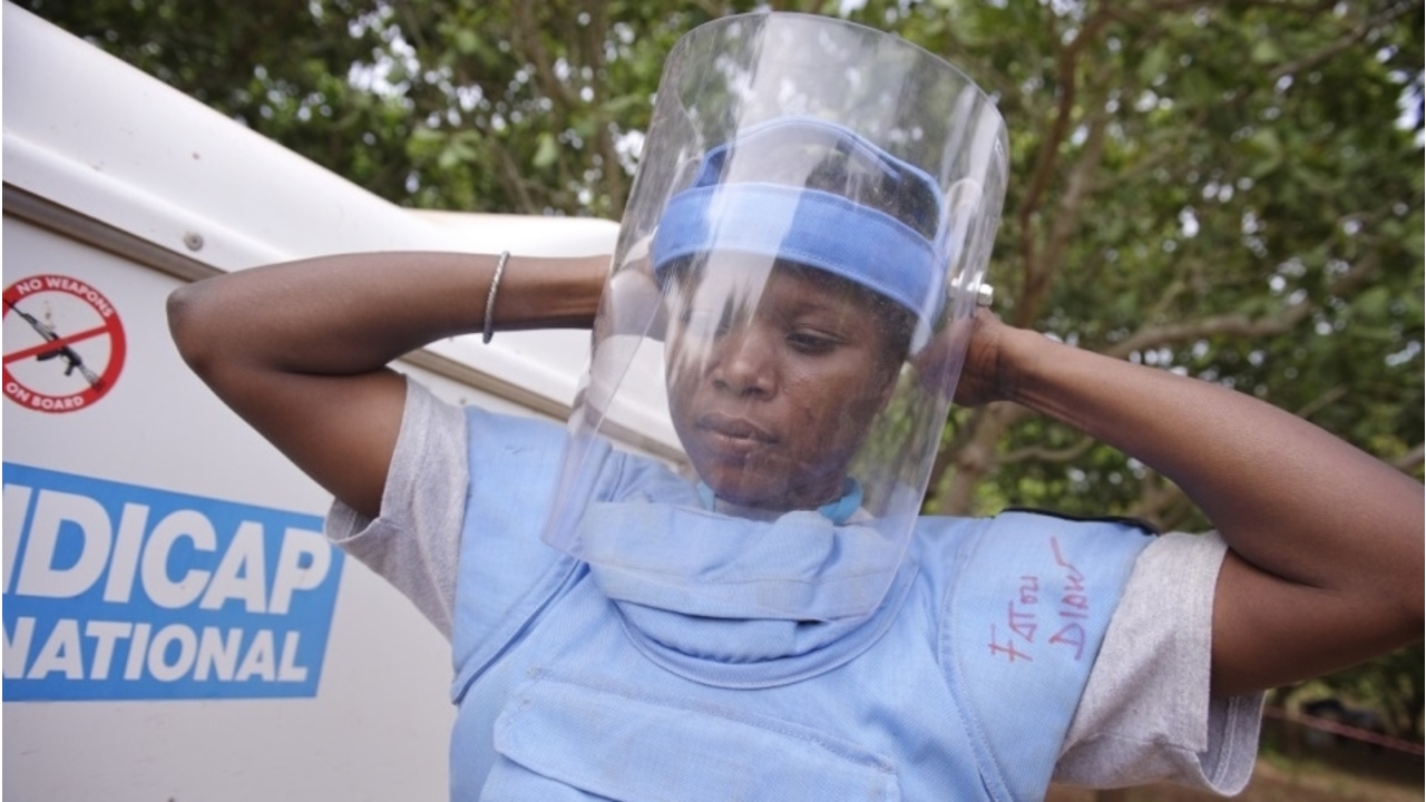 Deminer Fatou Diaw getting ready for a demining session.