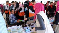 A Handicap International information stand on Mine Action Awareness Day with information to protect people from the dangers of unexploded weapons. Gaza.