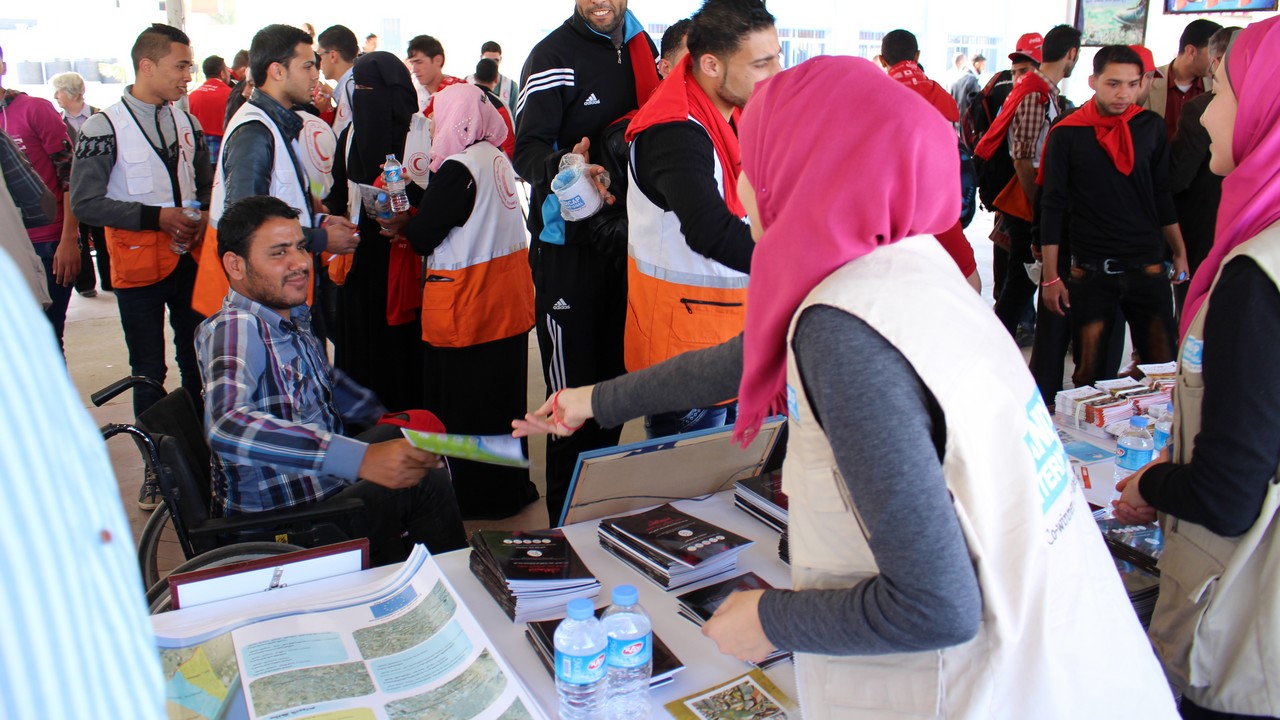 A Handicap International information stand on Mine Action Awareness Day with information to protect people from the dangers of unexploded weapons. Gaza.
