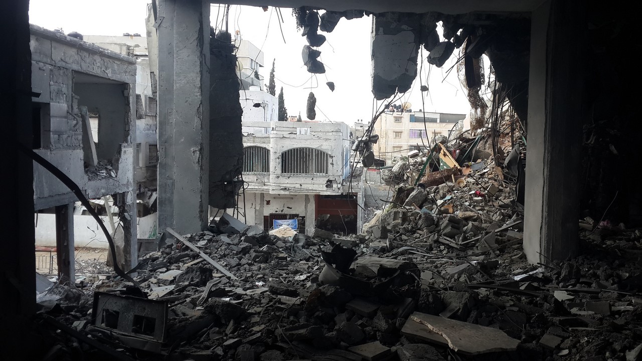 A photo of a building destroyed by air-strikes in teh summer of 2014. Gaza.