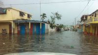 Street in Les Cayes flooded by rain on 20th October 2016.