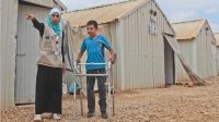 Mohammad and Noor in Azraq refugee camp, in Jordan