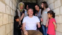 Giles Duley with Bana (left), her sister, and the HI rehabilitation team in Lebanon.