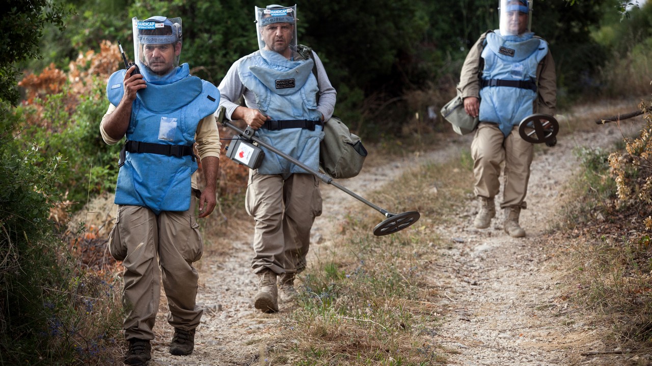 Handicap International deminers in North Lebanon