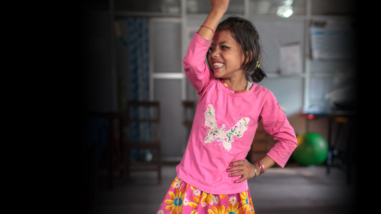 Nirmala, earthquake survivor, dancing at the National Disabled Fund.