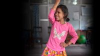 Nirmala, earthquake survivor, dancing at the National Disabled Fund.