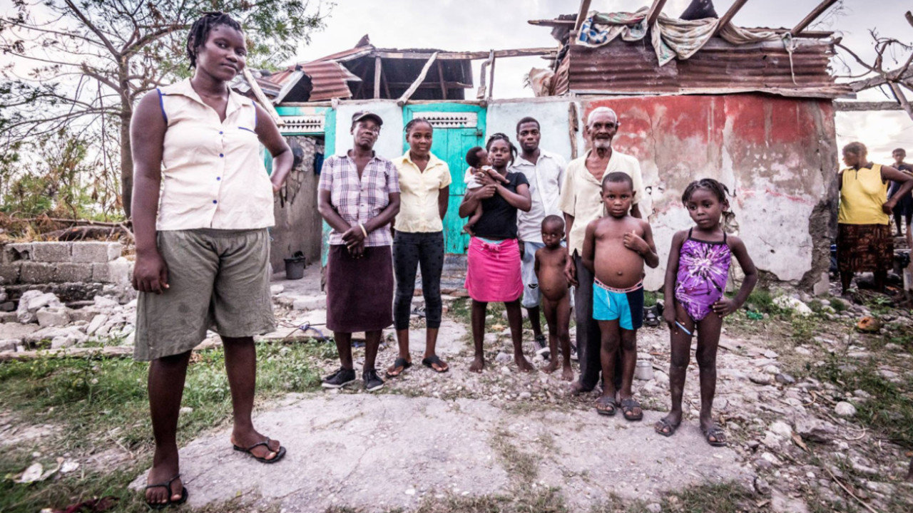 Inès Virgile outside her home destroyed by the hurricane. 