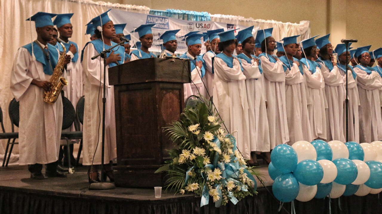 Newly qualifies rehabilitation professionals at their graduation ceremony, Haiti.