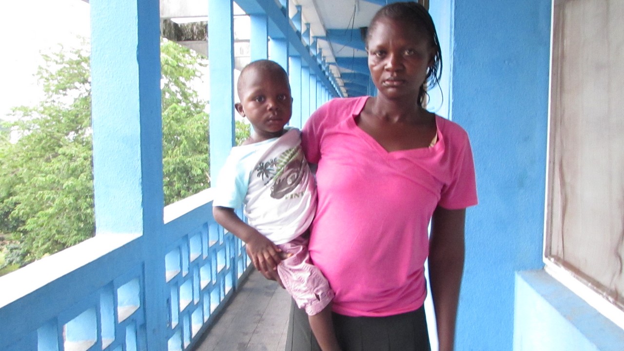 Two-year-old Glody with his mum. Democratic Republic of Congo.